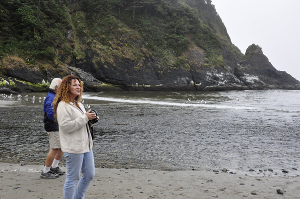 Lee Duquette and Ilse on the beach by Heceta Head Lighthouse
